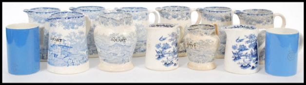 A collection of 19th Century Staffordshire blue and white transfer printed ceramic measuring jugs,