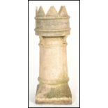 A 19th century Victorian salt glazed chimney pot. The crown top above and sloping panel body.