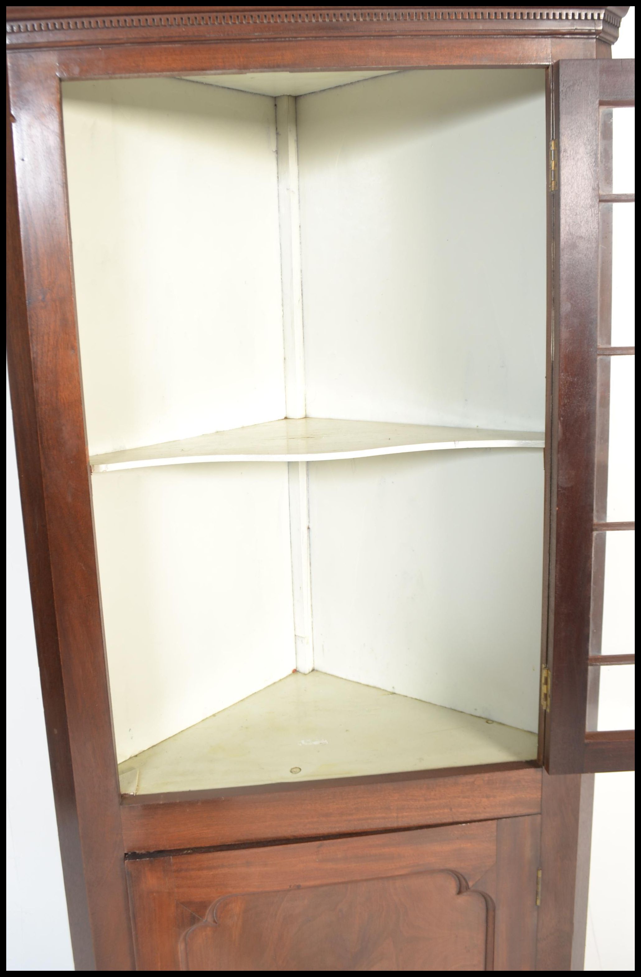 A Georgian 19th century mahogany corner cupboard of thin proportions having astragal glazed - Image 5 of 5