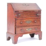 A 19th Century Victorian miniature dolls house mahogany bureau having brass batwing key