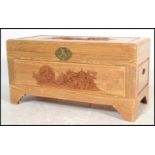 A mid century Chinese hardwood, possibly camphor wood coffer / blanket box chest with profusely