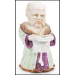 A 19th century Conta & Boehme porcelain tobacco jar & cover depicting a robed man reading The