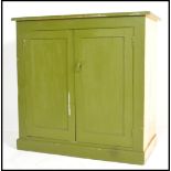 A 19th Century Victorian industrial / school painted pine cupboard / sideboard, fitted with two