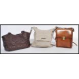 Vintage Fashion - A group of three ladies vintage leather handbags to include a Patrick Cox light