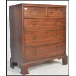 A George III 19th century mahogany bachelors 2 over 3 chest of drawers being raised on ogee  bracket