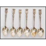 A collection of six French silver hallmarked souvenir tea spoons, the spoons with town crests to the