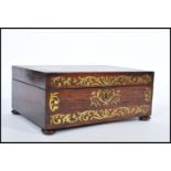 A 19th Century rosewood Victorian sewing /  wood box having inlaid brass scrolled decoration and