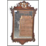 A 19th century mahogany framed Pier mirror having a central glass panel with wooden frame