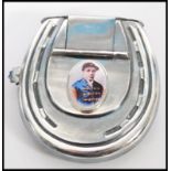 A silver plated vesta case in the form of a vesta case having an enamelled panel to the front