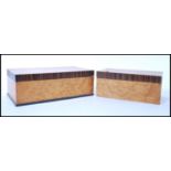 A pair of 20th century satin birds eye maple cross