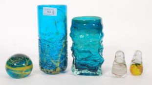 A selection of Mdina glassware to include a green and yellow swirl paperweight, two swirl