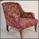 A 19th Century Victorian library armchair, believed Howard and Sons, original upholstery and