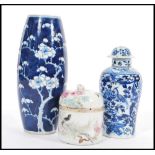 A group of 19th century Chinese ceramics comprising of a tall blue and white prunus pattern vase,