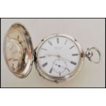 A 19th century Victorian silver hallmarked full hunter pocket watch having a key wind movement.