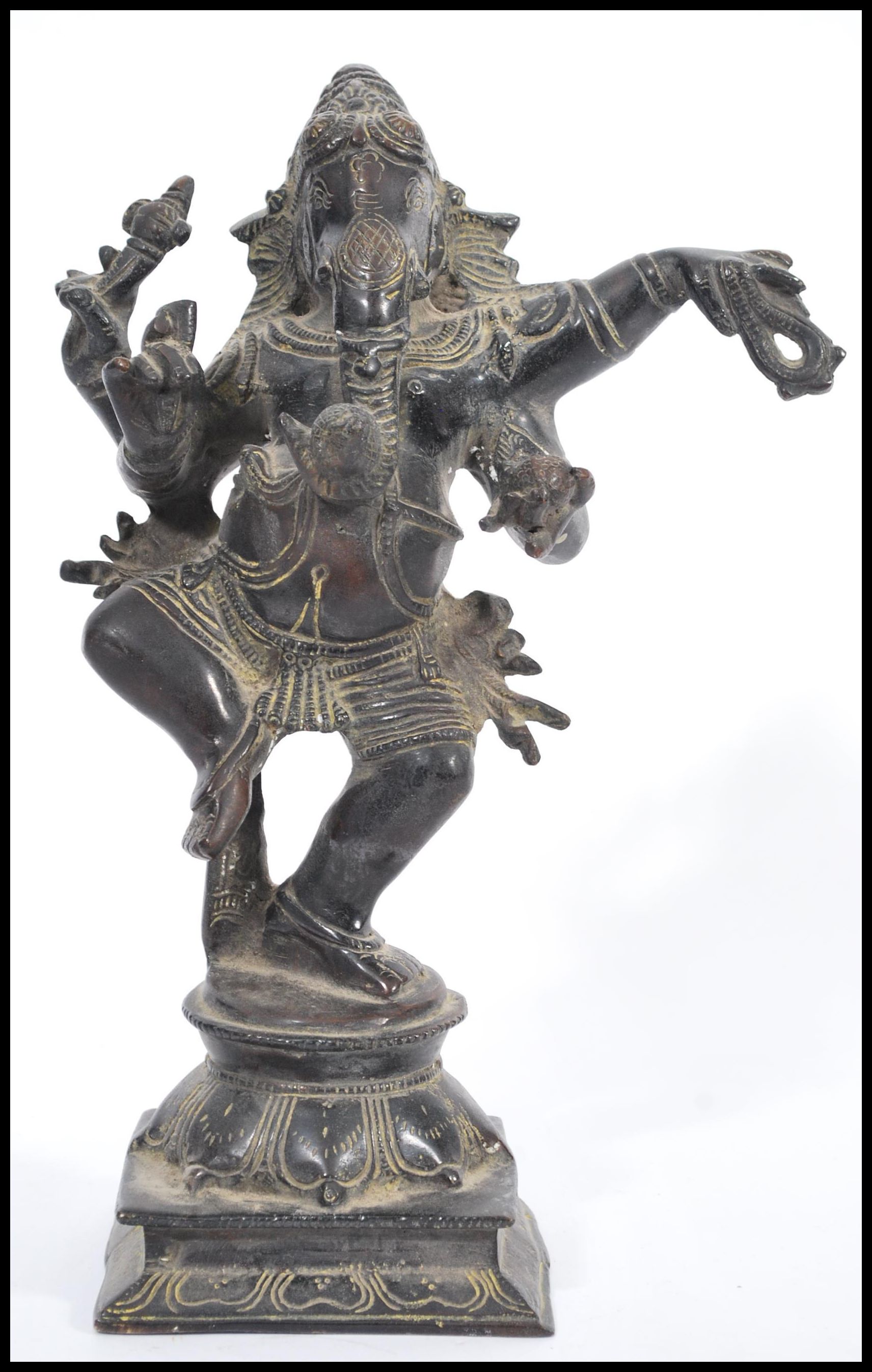 An early 20th century Indian bronze statue of the Hindu God Ganesha raised on square pedestal base