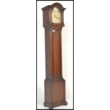 A good quality oak cased tempus fugit grandmother clock. The oak trunk and hood with inset gilt