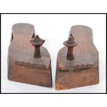 A pair of 19th century Chinese carved wooden shoes / clogs raised on large heel with turned wooden