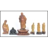 A group of Chinese carved soapstone figures dating from the 19th century to include elder wooden