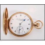 A vintage 20th century hallmarked 9ct gold full hunter pocket watch by Thos Russel and Son