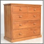 A Victorian pine country 2 over 3 chest of drawers. Raised on a plinth base with short and deep
