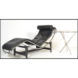 A modern Italian chrome metal framed LC4 adjustable chaise lounge after Le Corbusier, upholstered in