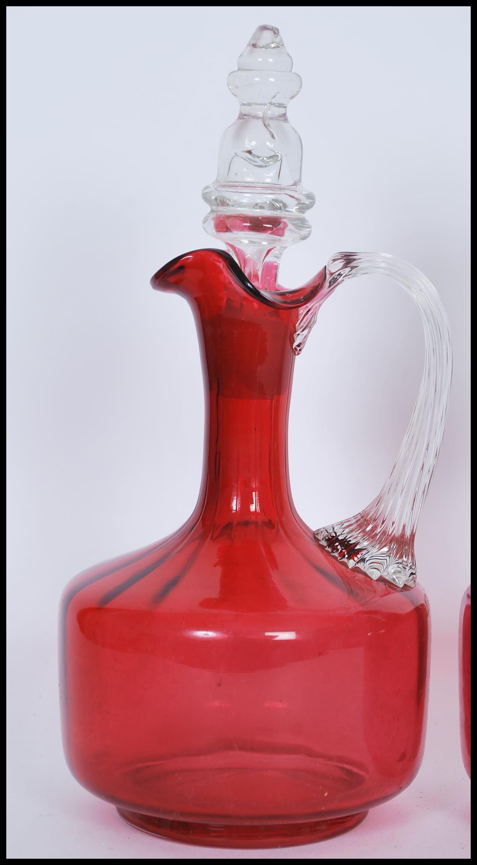 A pair of 19th Century Victorian cranberry glass decanters, both fitted with original cut glass - Image 2 of 5