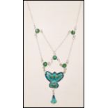 A stamped sterling silver necklace in the Art Nouveau style having blue and green enamelled panels