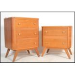 A mid 20th Century matching oak chest of drawers, the graduating drawers in a run of two and a run