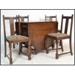 A Jaycee / Old Charm style oak drop leaf dining table together with a set of 4 dining chairs.