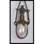 A Victorian French Mother of Pearl chatelaine stoppered perfume bottle with etched metal mounts