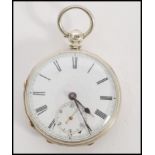 A 19th century Victorian silver hallmarked pocket watch having a fusee movement. The white enamel