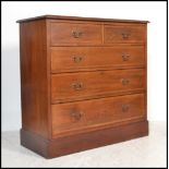 An Edwardian mahogany inlaid chest of drawers. Raised on a plinth base with 2 short over 3 deep