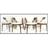 A set of four contemporary dining chairs designed by Stolar Gottfrid for Ikea, the ebonised