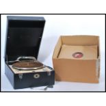 A vintage 20th century portable record player gramophone by Deca model 50 having hinged lid with