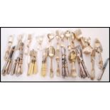 A collection of silver and silver plated flatware to include a set of six silver hallmarked