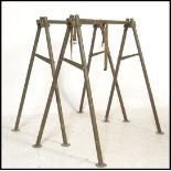 A pair of American military stretcher stands / coffin trestles  Vietnam war period painted khaki