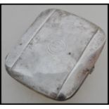 A vintage silver cigarette case of rectangular form having monogrammed SG. Stamped 800. Weighs 88