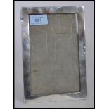 An early 20th century silver hallmarked photo picture frame of plain rectangular form. Hallmarked