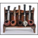 A group of vintage 20th century smoking tobacco pipes to include Polo, Pip Master, Hard Castle