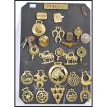 A collection of vintage 20th Century ( possibly earlier ) horse brasses and adornments, to include