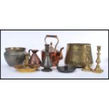 A collection of brass and copper items to include an Egyptian planter decorated with traditional