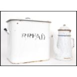 A vintage retro 20th century enamel bread bin along with a French enamel coffee pot. The bread bin