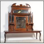 A late 19th Century Victorian classical revival rosewood and marquetry inlaid panelled mirror back