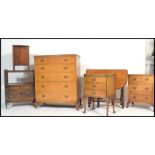 A collection of 20th century antique style furniture to include a good mid century maple walnut