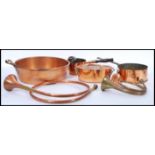 A good collection of 19th and 20th Century brass and copper pans to include riveted examples