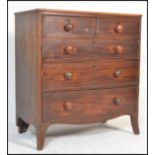 A Georgian 19th century mahogany chest of drawers having knob handles with a two short over three