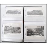 RAILWAY. Two albums of black and white photographic postcards featuring Railway Locomotives (170).