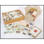 A collection of vintage cigarette and tea cards dating from the first half of the 20th Century to