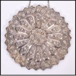 A vintage 20th Century wall hanging silver hallmarked Continental mirror, scalloped edge with