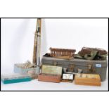 A collection of vintage 20th century fishing gear and equipments to include carry, old split cane